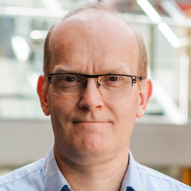 Headshot of Steven Newhouse.