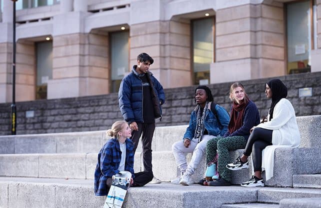 students-on-steps-about-us-photo-slice
