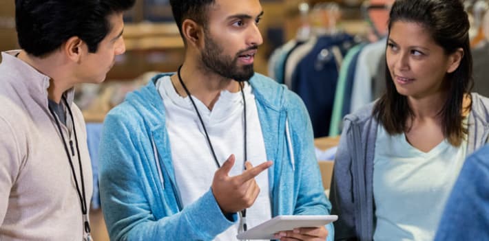 Three charity organisation workers collaborating together