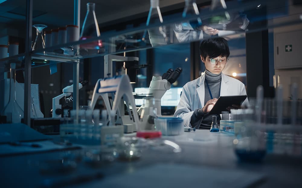 researcher-in-a-lab-with-tablet-cyber-security-research-and-innovation-campaign-topbox