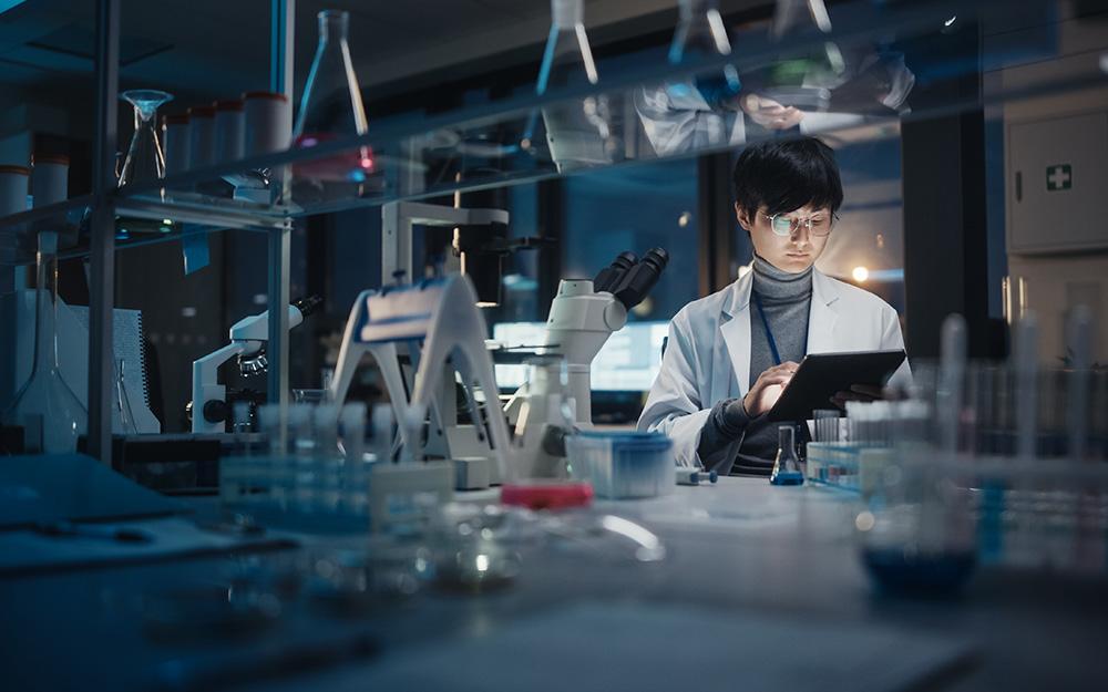 researcher-in-a-lab-with-tablet-cyber-security-research-and-innovation-campaign-topbox